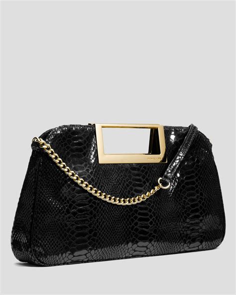 michael kors black clutch purse|Michael Kors berkley clutch.